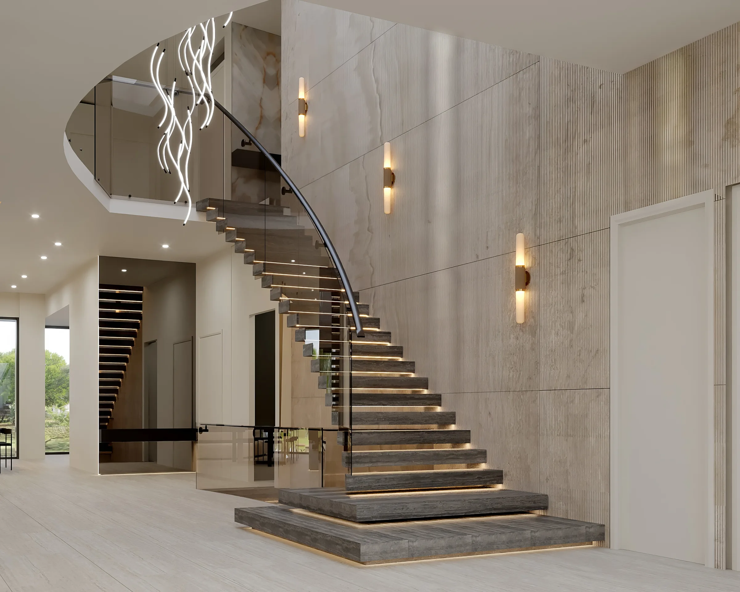 Double-height stair hall with floating grey stone treads, glass balustrades and a looping sculptural pendant